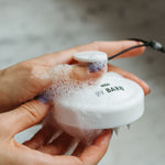 Scalp brush exempelbild i duschen